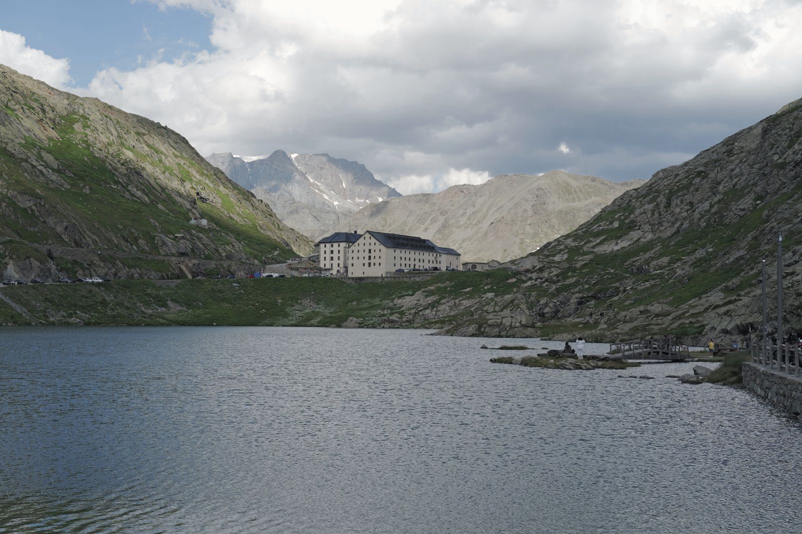 A hospice beside a lake at the top of a pass